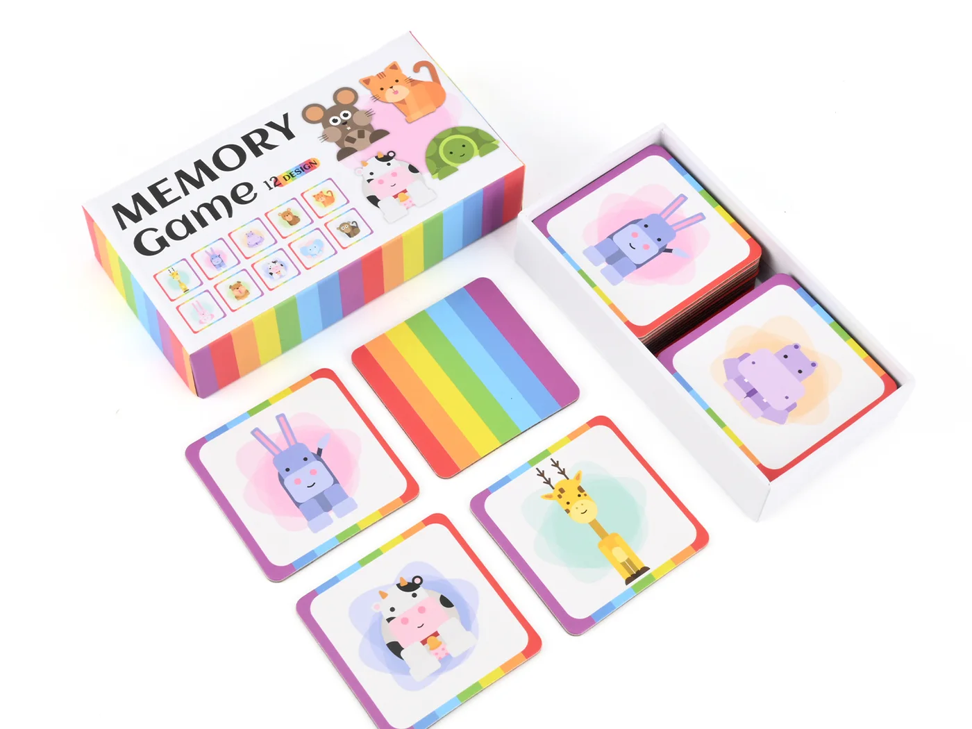 Printed memory matching game showing card faces, a shared card back, card stacks, and retail box packaging